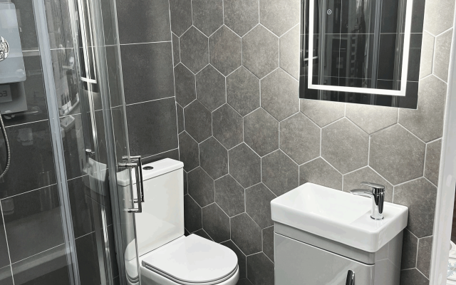 Explore our sleek small bathroom suite featuring modern design elements.