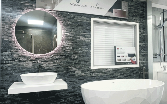 Explore our stunning free-standing bath and sleek granite tiles, perfect for any modern bathroom design!